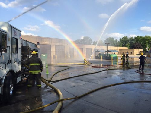 Fireman with hoses